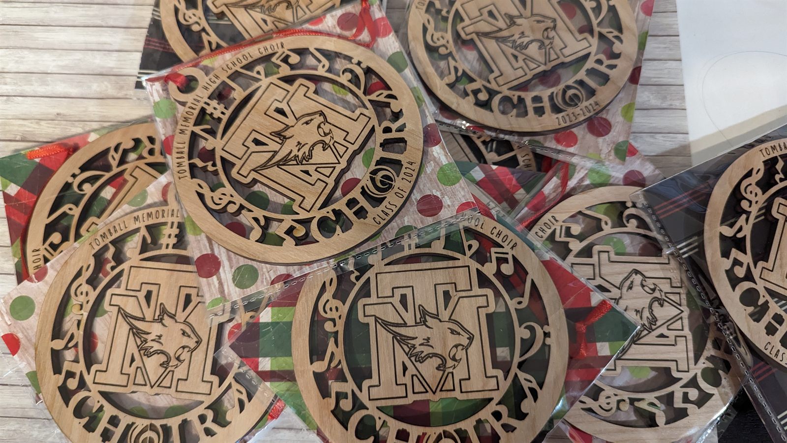 Matching school choir fundraiser ornaments packaged together