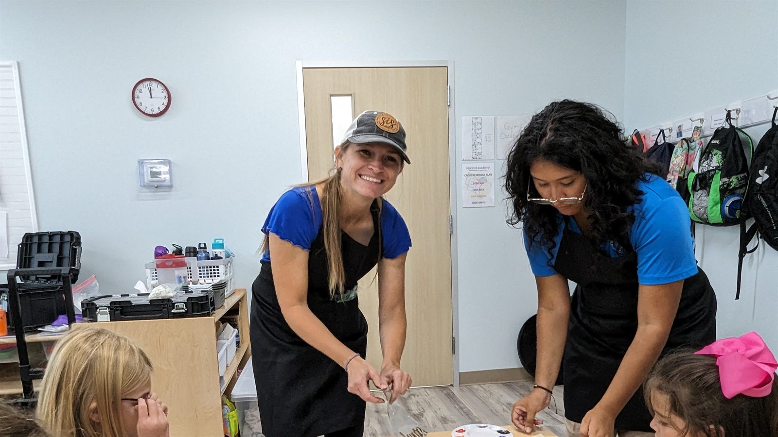 SIS team leading a creative kids group activity
